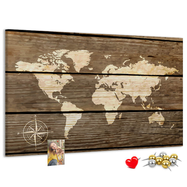 Prikbord wereldkaart op een achtergrond van houten planken