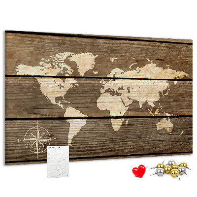 Prikbord wereldkaart op een achtergrond van houten planken