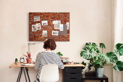 Kurk prikbord met een print van een bakstenen muur in warme tinten