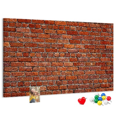 Kurk prikbord met een print van een bakstenen muur in warme tinten