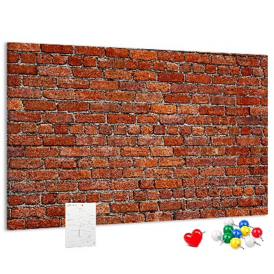 Kurk prikbord met een print van een bakstenen muur in warme tinten