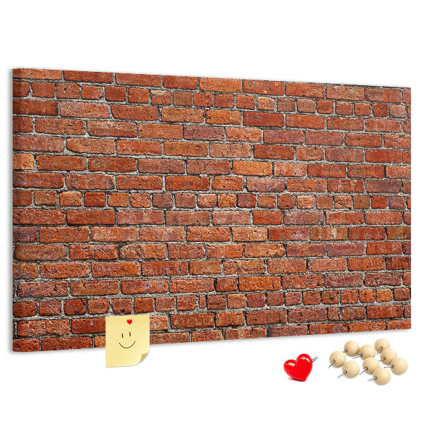 Kurk prikbord met een print van een bakstenen muur in warme tinten