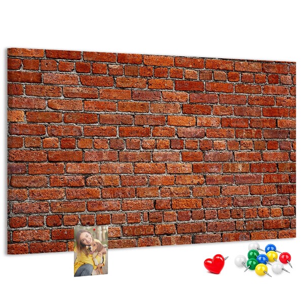 Kurk prikbord met een print van een bakstenen muur in warme tinten