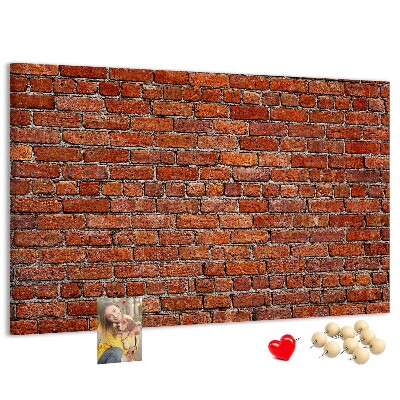 Kurk prikbord met een print van een bakstenen muur in warme tinten