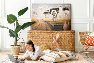 Prikbord met een Afrikaans landschap van een weg met een boom