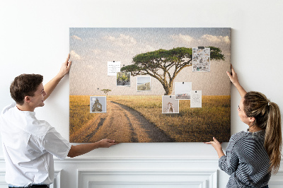 Prikbord met een Afrikaans landschap van een weg met een boom