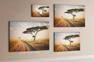 Prikbord met een Afrikaans landschap van een weg met een boom