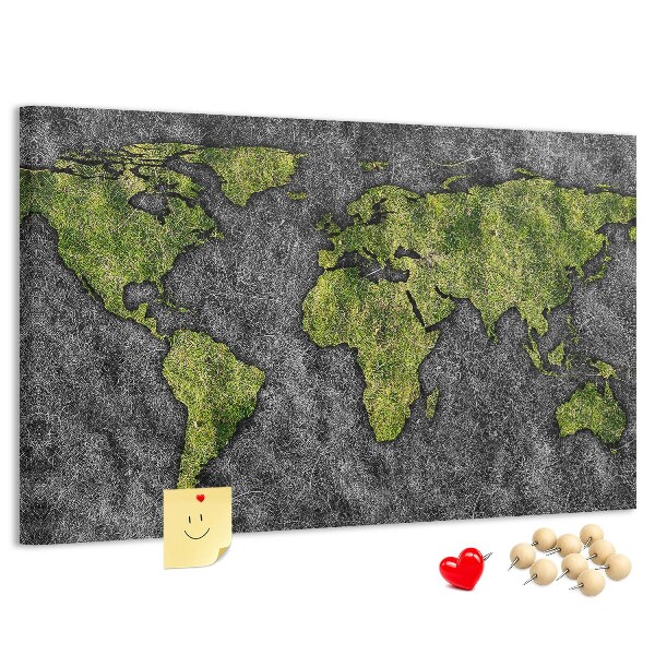 Kurkbord met een groene wereldkaart op een grijze achtergrond