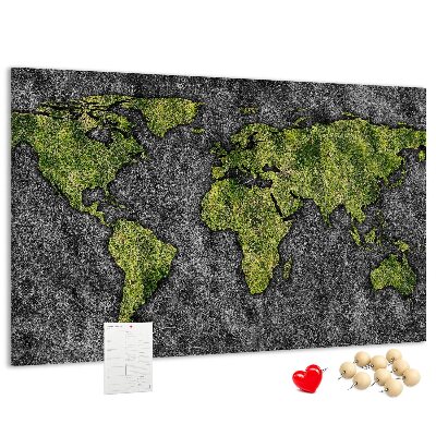 Kurkbord met een groene wereldkaart op een grijze achtergrond
