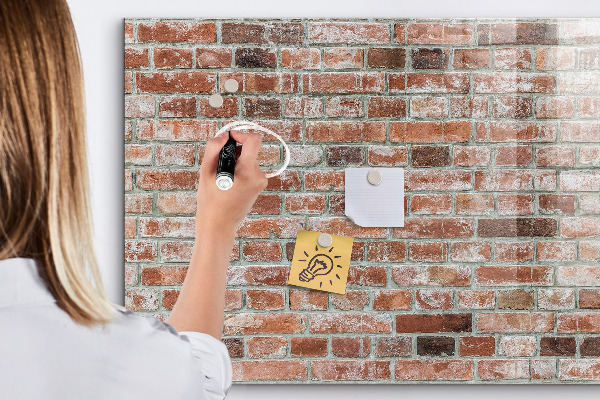 Memobord van glas met print inclusief neodymium magneten Fotobord op een bakstenen muur