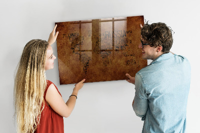 Decoratief glazen wandbord beschrijfbaar en magnetisch Een wereldkaart met persoonlijke herinneringen.