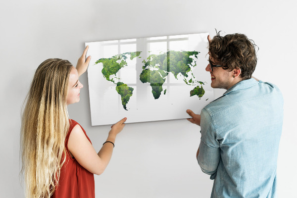 Decoratief glazen wandbord beschrijfbaar en magnetisch Groene wereldkaart met foto's