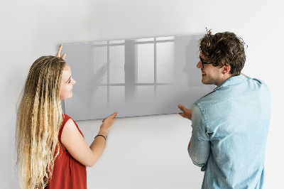 Decoratief glazen wandbord beschrijfbaar en magnetisch Een praktisch prikbord voor notities en foto's.