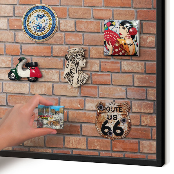 Wandbord voor magneten in een zwarte lijst Bakstenen muur