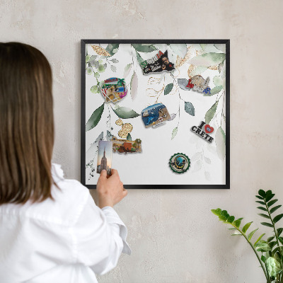 Wandbord voor magneten in een zwarte lijst Groene bladeren