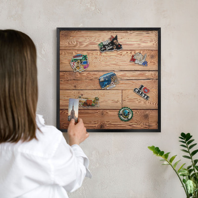 Wandbord voor magneten in een zwarte lijst Houten planken