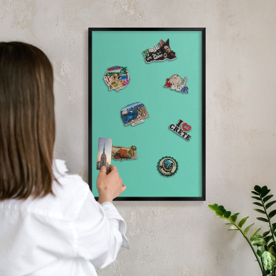 Wandbord voor magneten in een zwarte lijst Sterke munt