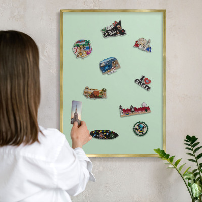 Metalen magneetbord met lijst in het goud Mintgroen