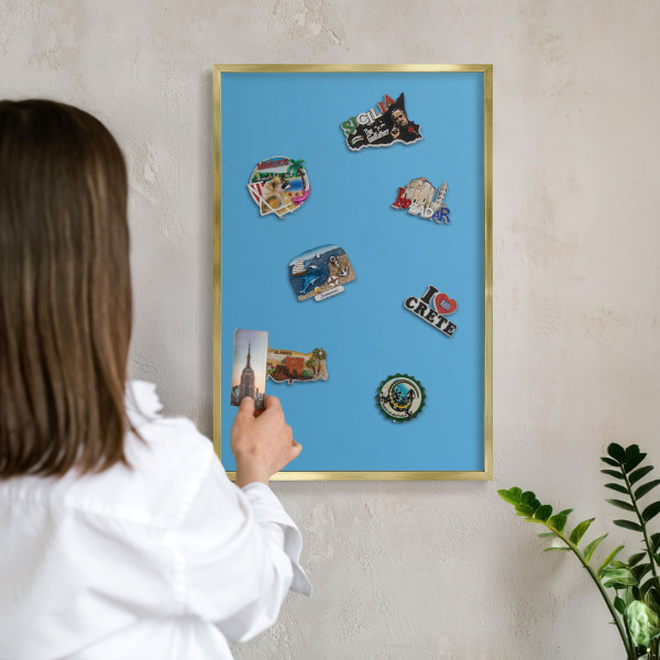 Metalen magneetbord met lijst in het goud Blauw water