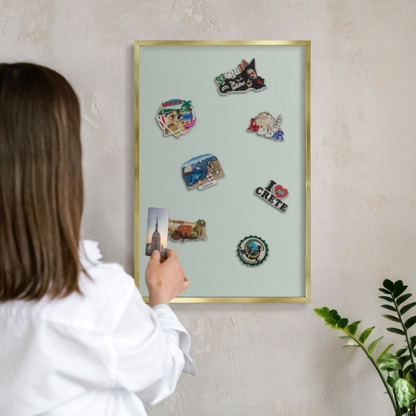Metalen magneetbord met lijst in het goud Lichte munt