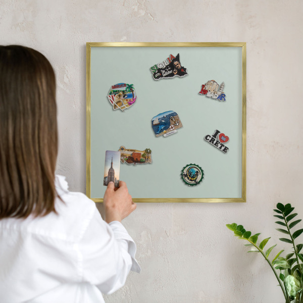 Metalen magneetbord met lijst in het goud Lichte munt