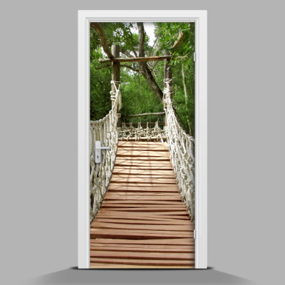 Zelfklevende deursticker De weg het bos in.