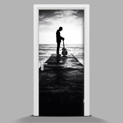 Zelfklevende deursticker Man met een gitaar