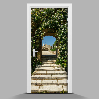 Deursticker Een doorgang tussen de rozen