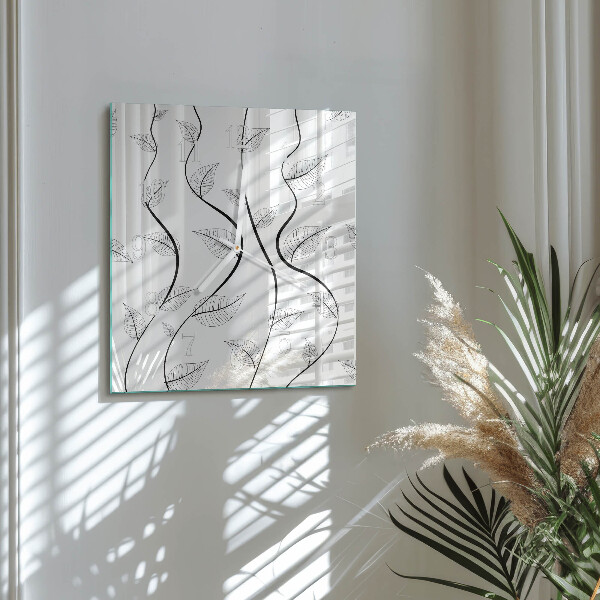 Vierkante glazen klok De kunst van de bladeren