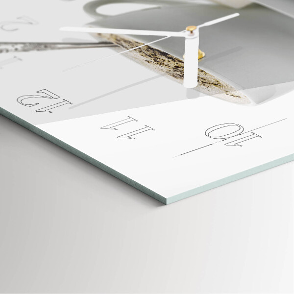 Vierkante glazen klok Een kopje anijs