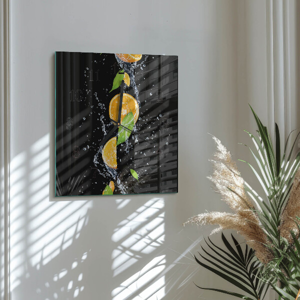 Vierkante glazen wandklok sinaasappels