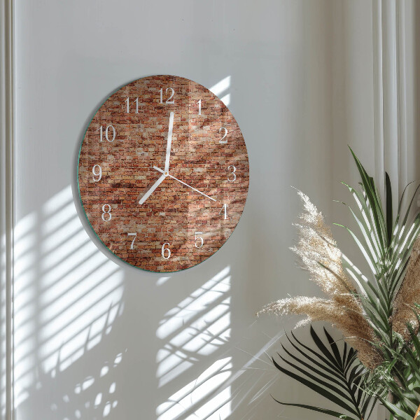 Ronde glazen klok Bakstenen muur